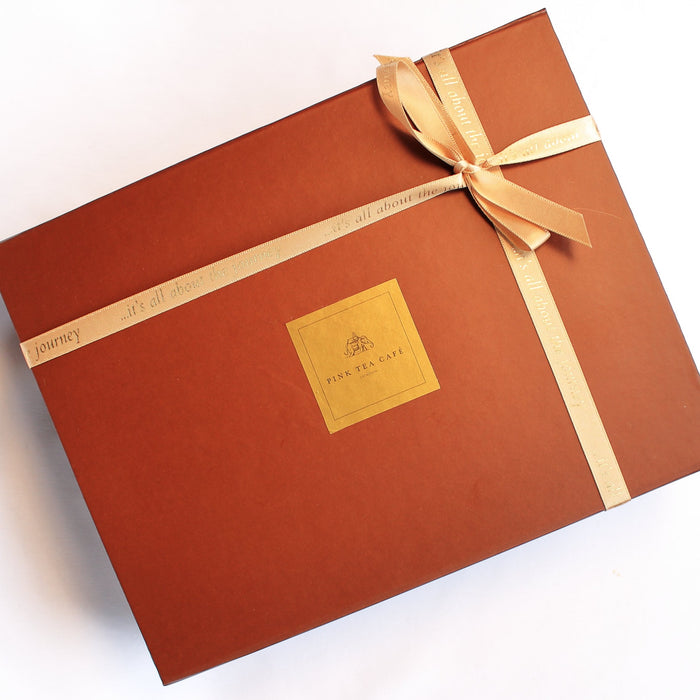Gift set comes with in box with a golden ribbon