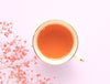 Vibrant peach colour of the tea made with China Pink Tropics