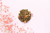 Loose leave green tea with pieces of mango, guava, beetroot, apple