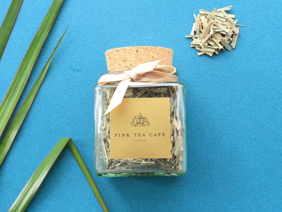 Square glass jar with golden ribbon and cork lid