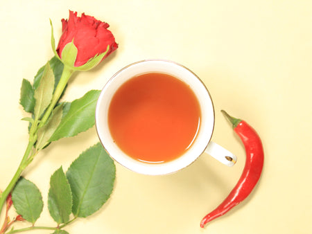 The deep red colour of the brewed tea made with our Classic Tumeric Chai