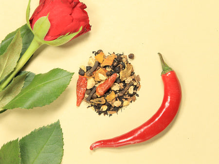 Black tea leaves of the Classic Turmeric Chai with other key ingredients like chilli, pepper, turmeric and ginger